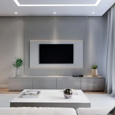 Siv TV zid od uspravnih letvica sa LED svetlom oko ravne površine iza televizora i niskom komodom